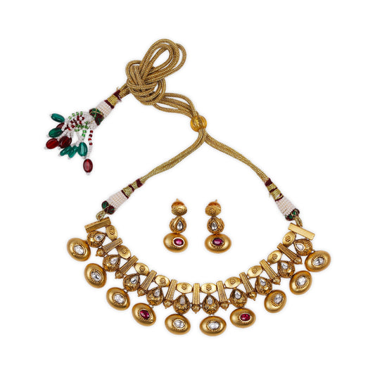 Kadi style Gold polished Rajwadi necklace set adorned with Kundan and Rubi stones