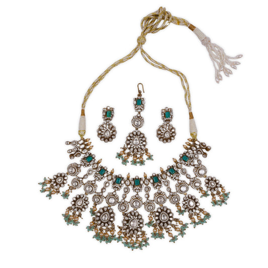 Stunning Moissanite Kundan Set with Sea-Green Droppings, Intricate Gold-Toned Setting, and AD (American Diamond) Embellishments for a Grand and Graceful Look