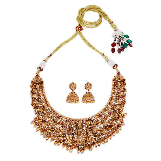 Antique Temple-Style Round Necklace featuring Goddess Lakshmi, Adorned with Ruby and Green Emerald Stones, Complemented by a Beautifully Designed Jhumka