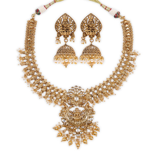 Exquisite Antique Temple-Style Necklace with Sitting Lakshmiji Pendant, Delicate Kundan Work, Lustrous White Pearls, and Matching Jhumkas