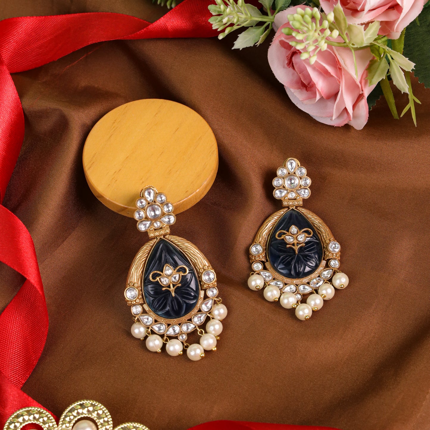 Indo-Western Style Pachi Kundan Earrings: Intricate Design with Carved Glass Stones and Antique Matte Gold Finish the striking blue color adds a bold, sophisticated touch