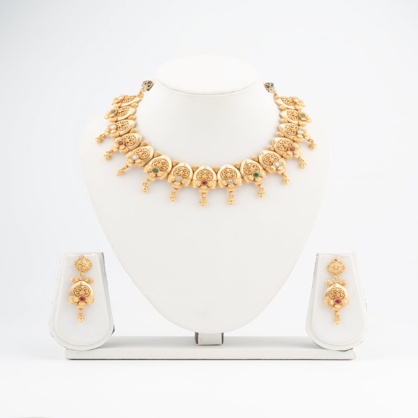 Embrace Heritage: Brass Temple Necklace with Leaf Detailing & Gem Accents