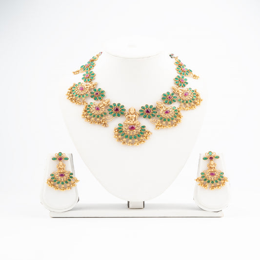Regal Lakshmi Temple Jewelry Set in Antique Gold with Floral Kundan Detailing