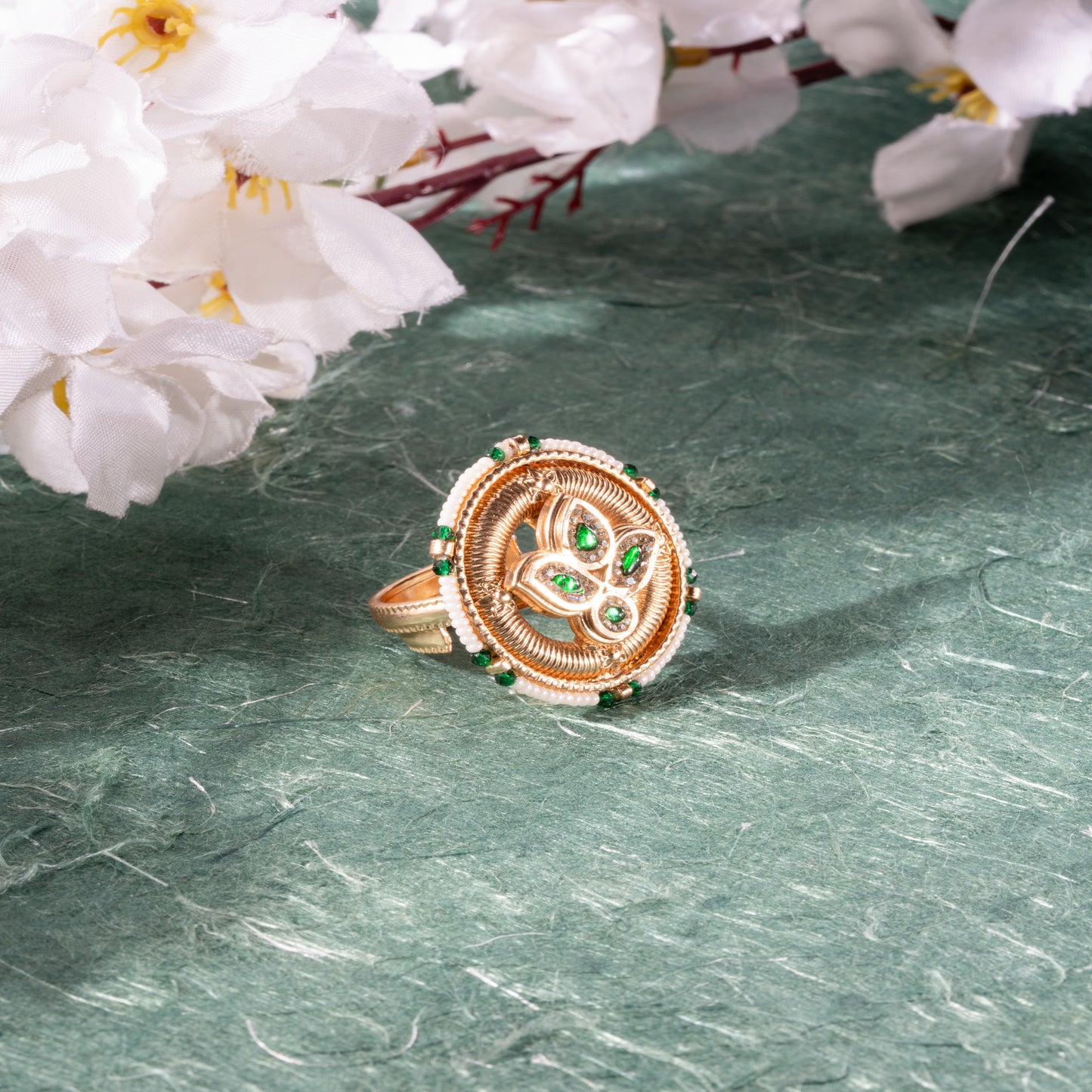 Regal Gold-Toned Ring with Green Gem Accents & Beaded Border