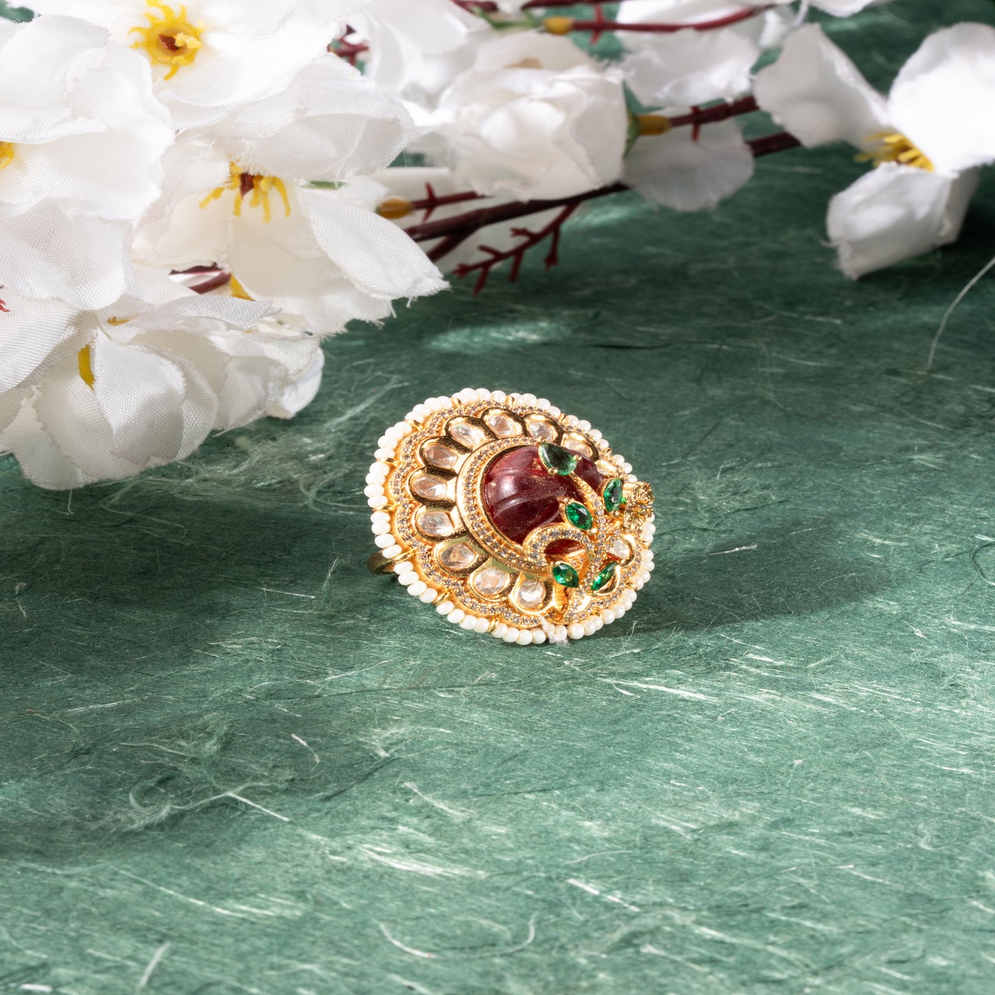 Exquisite Gold-Polished Statement Ring with Ruby Carving and Pearl Accents