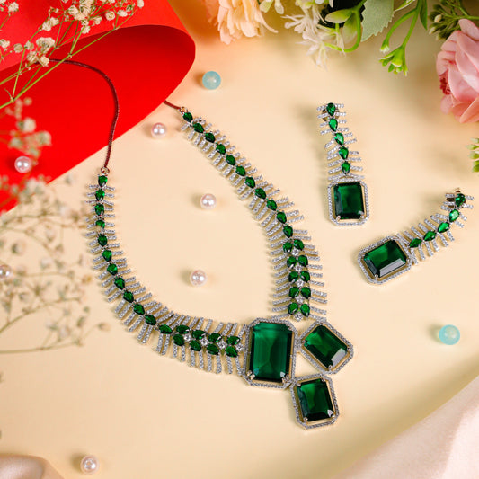 Western-Inspired Design: American Diamond Bottle Green Necklace with 3 Large Stone-Like Centerpieces & Rhodium Polish Finish with a pair of curved earrings