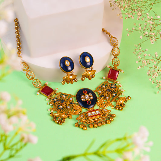 Indo-Western Style with Antique touch Necklace studded with Kundan & Ruby Stones, White Pearls, Navy Blue Center Stone & Matching Earrings