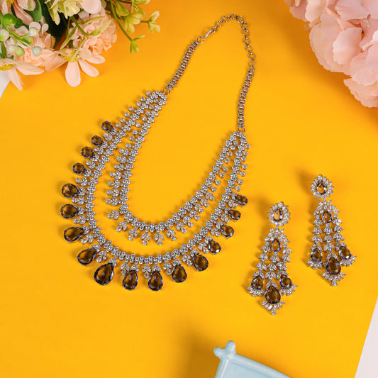 Elegant AD (American Diamond) Two-Line Necklace Set Adorned with Light Purple Stones and Matching Hanging-Style Earrings