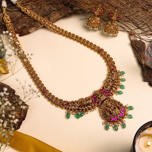 Long Antique Temple-Style Necklace with Striking Ruby, Sea Green Onyx, and Sitting Lakshmiji Pendant, Accentuated by Delicate White Pearls
