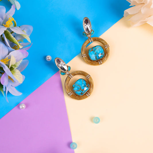 Indo-Western Style Moissanite Kundan Earrings, firoza color granite stone is at the center and crafted with high-quality brass metal and antique gold polish