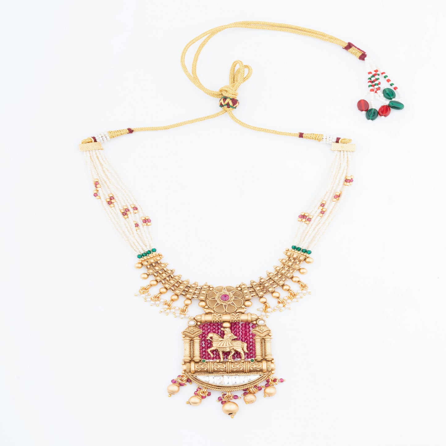 Heritage jewellery depicting a groom riding a horse in Indian weddings