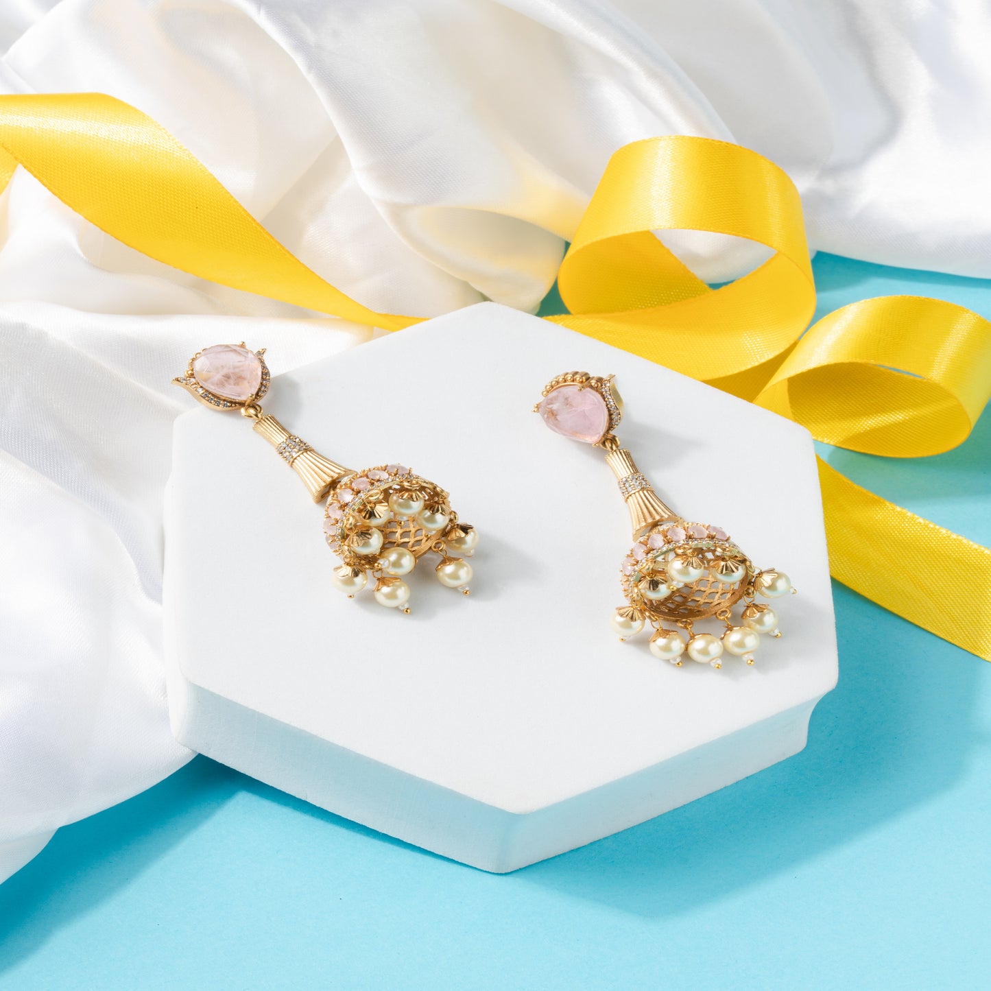 Indo western style Gold-Polished Jhumka Earrings with Kundan, Baby Pink Stones & Yellow Pearls