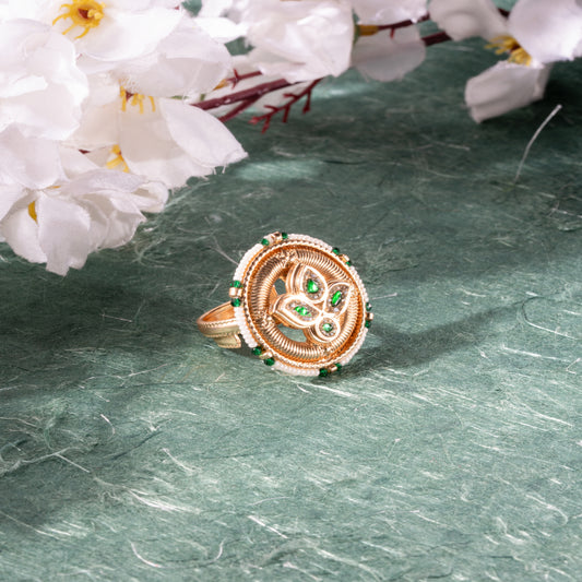 Regal Gold-Toned Ring with Green Gem Accents & Beaded Border
