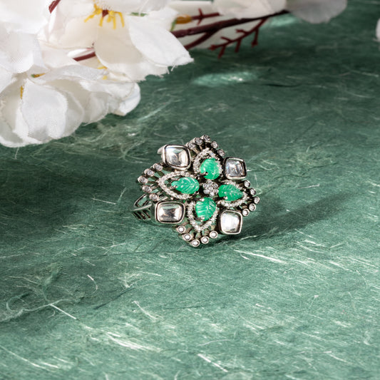 Floral-inspired design with carved green leaf-shaped stones at the center, Kundan, AD
