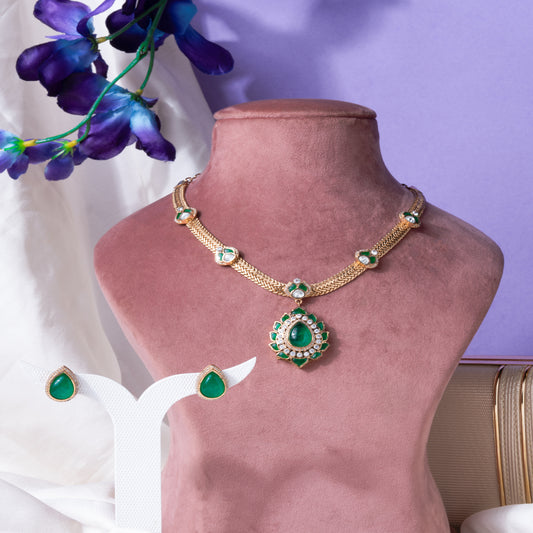 Regal Grace: Emerald-Embellished Kundan, AD Pendant necklace Set in Gold Finish"