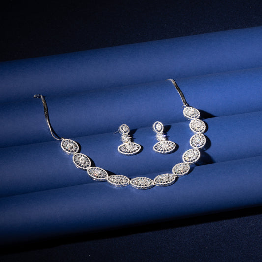 American Diamond Necklace Set detailing oval shaped motifs with Rhodium Polish on Brass